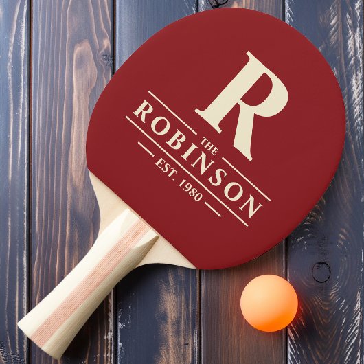 Raquette De Ping Pong Nom de famille et canneberge profonde initiale