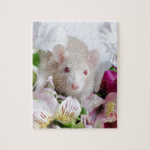 Rat in bloemen. legpuzzel