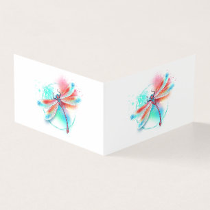 Red dragonfly on watercolor background