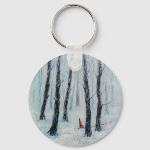 Red Riding Hood-achtige figuur in een winterbos Sleutelhanger