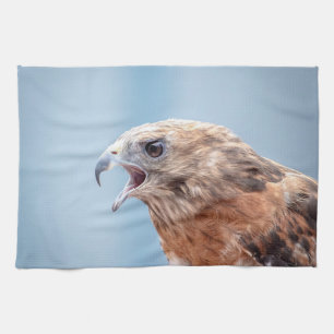 Red Shoulked Hawk op een rots Theedoek