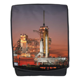 Red Sky voor Space Shuttle Atlantis Lancering Rugtassen