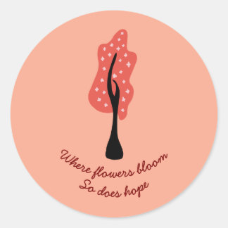 Red tree in blossom with pink flowers and quote ronde sticker