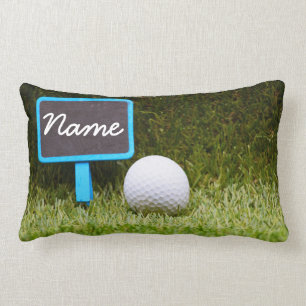 reddingsbord met golfbal op groen gras kussen