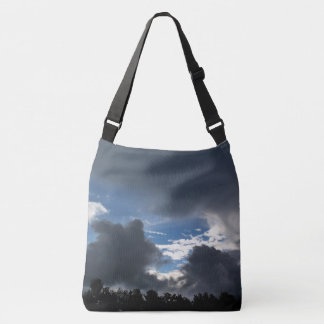 Regen, douches en blauwe hemels crossbody tas