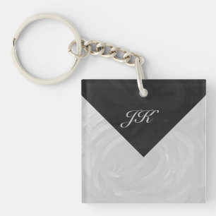 Regenachtige lucht grijs en zwart monogram sleutelhanger