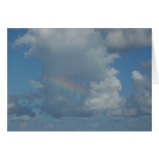 Regenboog in wolken