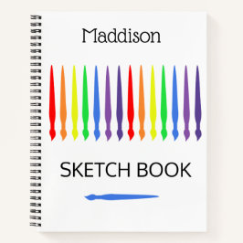 Regenboog van penselen, schetsboek, jouw naam notitieboek