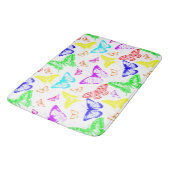 Regenbooggekleurde vlinders vliegen badmat (Gekanteld)