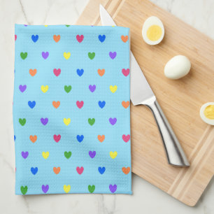 Regenboogpolka harten op babyblauw theedoek