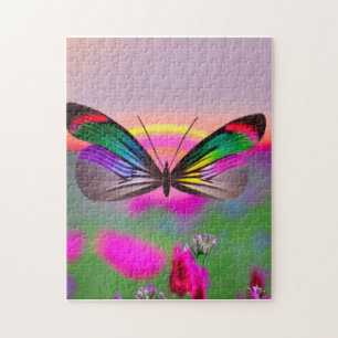 Regenboogvlinder die over een gebied van bloemen v legpuzzel