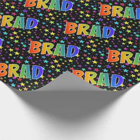 Regenboogvoornaam "BRAD" + sterren Cadeaupapier (Hoek)