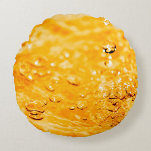 Reinigingsoppervlak waterrimpelvloeistof rond kussen