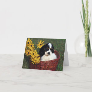 Remerciements Chiot et fleurs dans une carte de note de panier