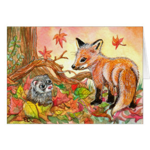 Renard et furet dans les feuilles d'automne