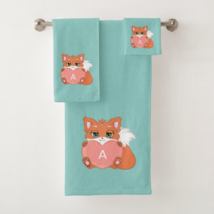 Renard mignon et monogramme sur bleu clair