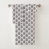 Repeating black floral pattern towel