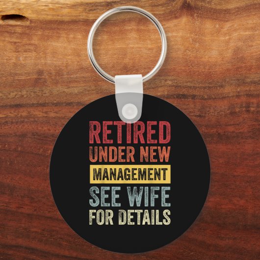 Retired Under New Management See Wife For Details  Sleutelhanger (Voorkant)