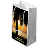 Retraite, sac de cadeau, palmier dans le coucher (Dos Angle)