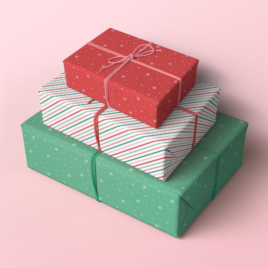 Retro kerstpatronen in rood, roze en groen inpakpapier vel