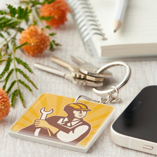 Retro monteur met sleutel sleutelhanger