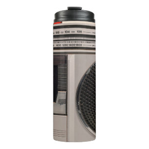 Retro outdated portable stereo radio cassette reco thermosbeker
