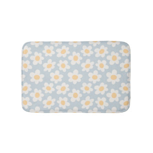 Retro stijl madeliefjes in bloei op blauwe achterg badmat