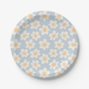 Retro stijl madeliefjes in bloei op blauwe achterg papieren bordje