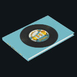 Retro Vinyl 50th Birthday Party Livre d'invité<br><div class="desc">Drôle visuel avec un vrai disque vinyle de 45 tours (image imprimée) pour votre fête de 50e anniversaire. Conception du livre d'hôtes à couverture rigide avec texte à customiser. Invitation d'anniversaire et autocollants correspondants. Émerveillez vos amis et votre famille avec ce record vintage des années 60 !</div>
