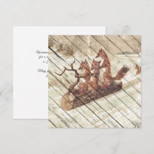 Retro vun vos riet een buiklaag op sneeuw feestdagenkaart