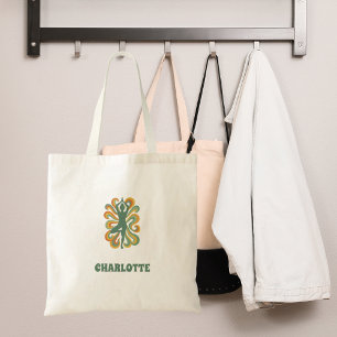 Retro yogahouding wervelingen groene oranje naam tote bag