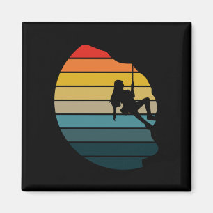 Retro zonsondergang rotsklimmen rugzakker berg magneet