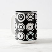 Retrocirkels zwart-wit tweekleurige koffiemok (Voorkant links)