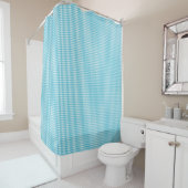 Rideaux De Douche A blue checkered shower curtain is shown (En situation)