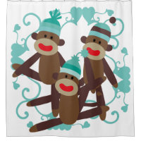 Singes de chaussette avec les coeurs bleus
