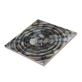 Rippels en keibelen tegeltje (Zijkant)