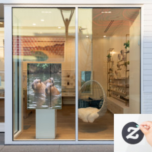 River Serenity: Capybaras Zwemmen in de Flow Raamsticker