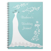 Robe blanche sur le carnet de wedding planner (Devant)