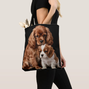 Robijn Cavalier Spaniel en haar Blenheim-puppy Draagtas