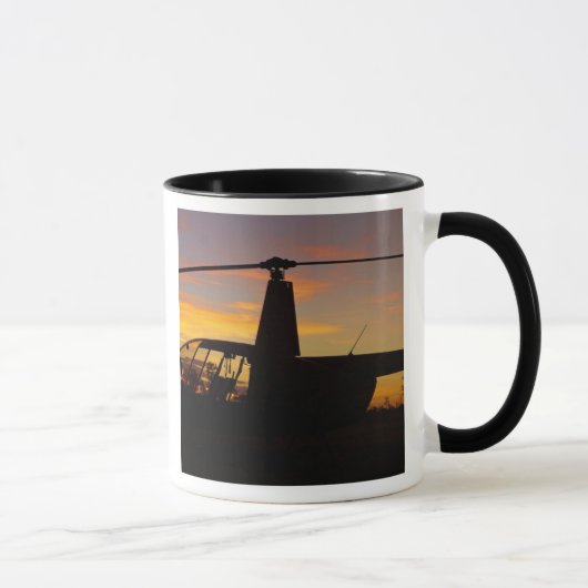 Robinson R44-helikopter op zonsondergang Mok (Rechts)