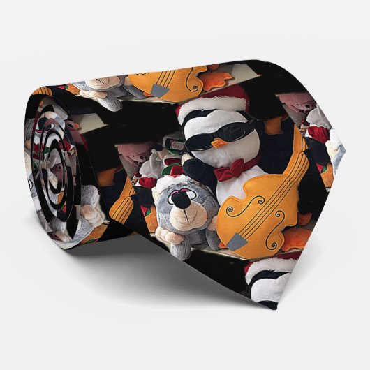 ROCK EN ROLL CHRISTMAS PENGUIN STROPDAS (Opgerold)