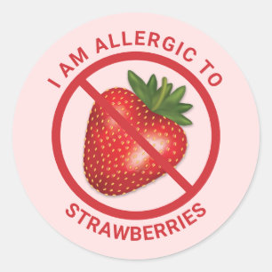 Rode aardbeivrucht op roze allergiebewustzijn ronde sticker