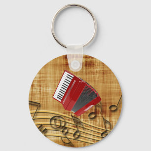 Rode accordeon, zwarte noten, gouden achtergrond sleutelhanger