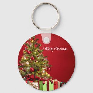 Rode achtergrond met decoratieve kerstboom sleutelhanger