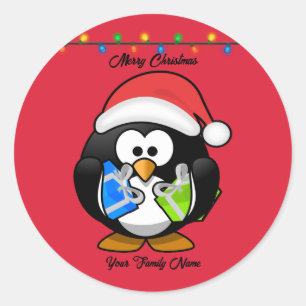 Rode achtergrond pinguïn met kerstcadeaus ronde sticker