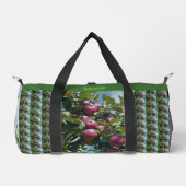 Rode appels op de boom land gepersonaliseerd plunjezak (Voorkant)