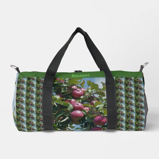 Rode appels op de boom land gepersonaliseerd plunjezak (Voorkant)