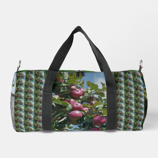 Rode appels op de boom land gepersonaliseerd plunjezak (Achterkant)