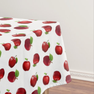 Rode appels op wit tafelkleed
