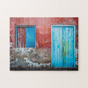 Rode, blauwe en grijze wand, deur en raam legpuzzel
